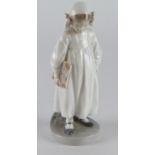Royal Copenhagen figure, depicting a young girl holding a book (no. 922), makers marks to base,