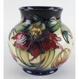Moorcroft 'Anna Lily' pattern vase, makers marks to base, height 14cm approx.