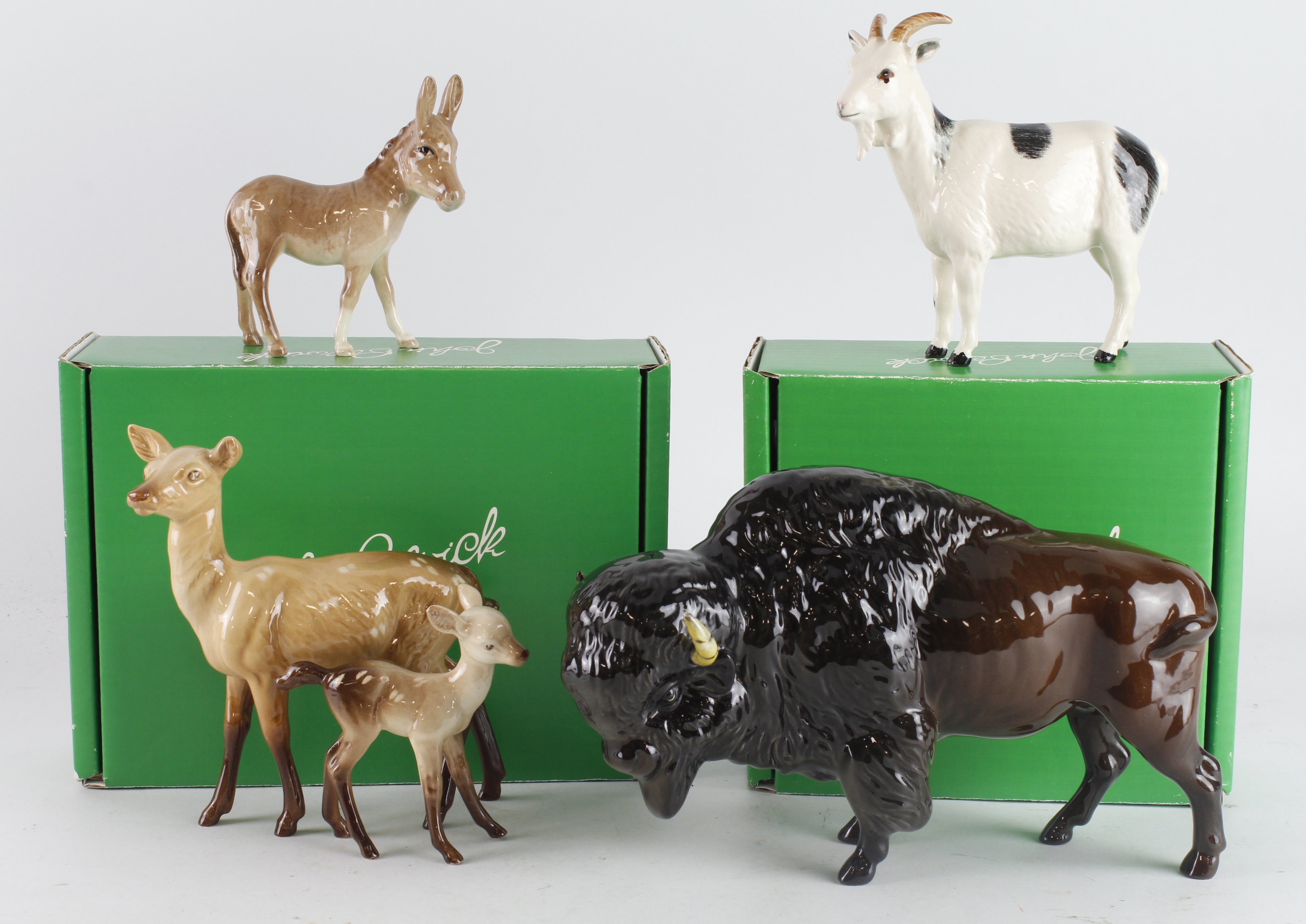 Beswick. Five Beswick figures, comprising Bison, two Deer, Donkey & Goat, tallest 14.5cm approx. (
