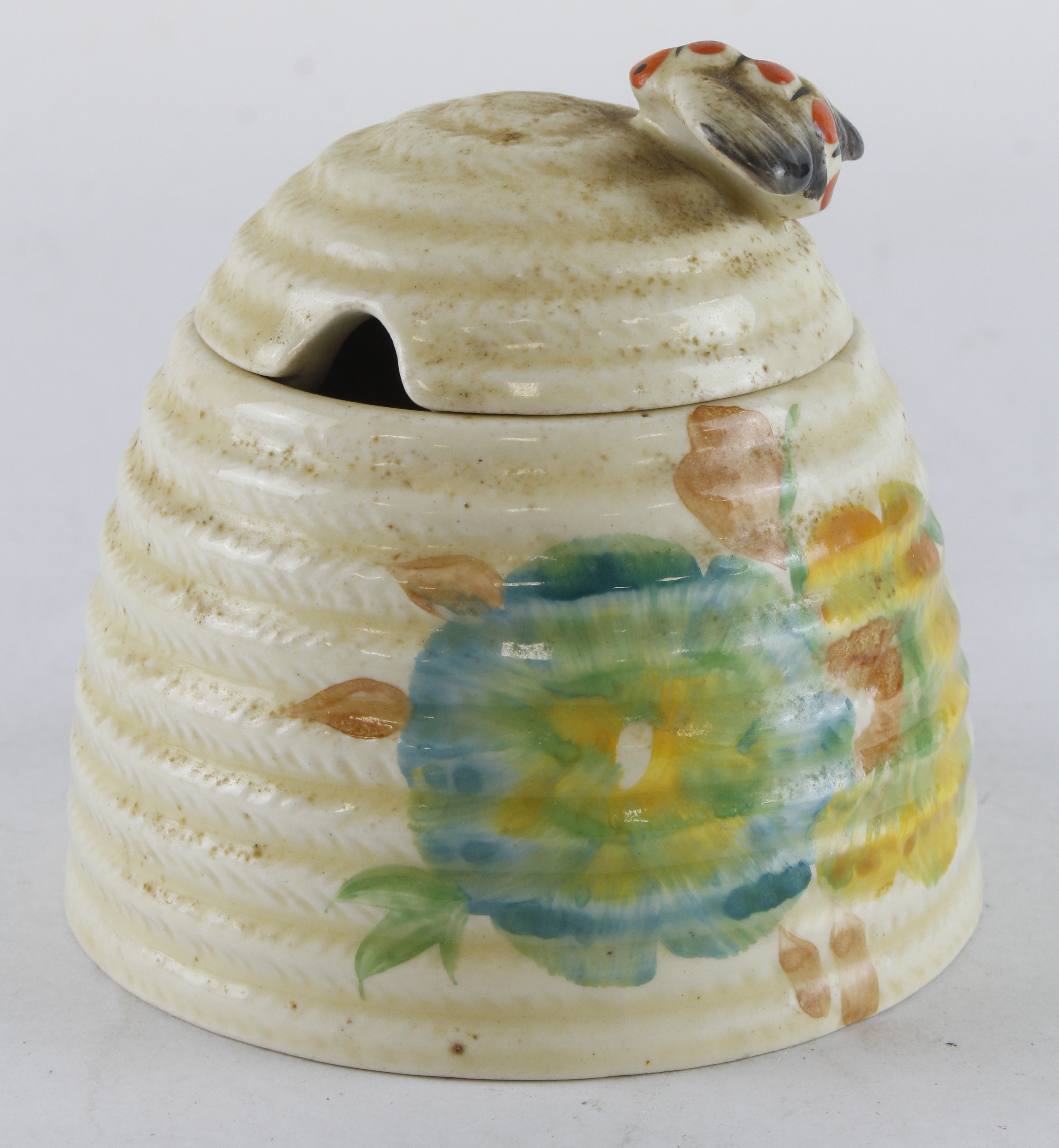 Clarice Cliff beehive honey pot, makers mark to base height 85mm approx.