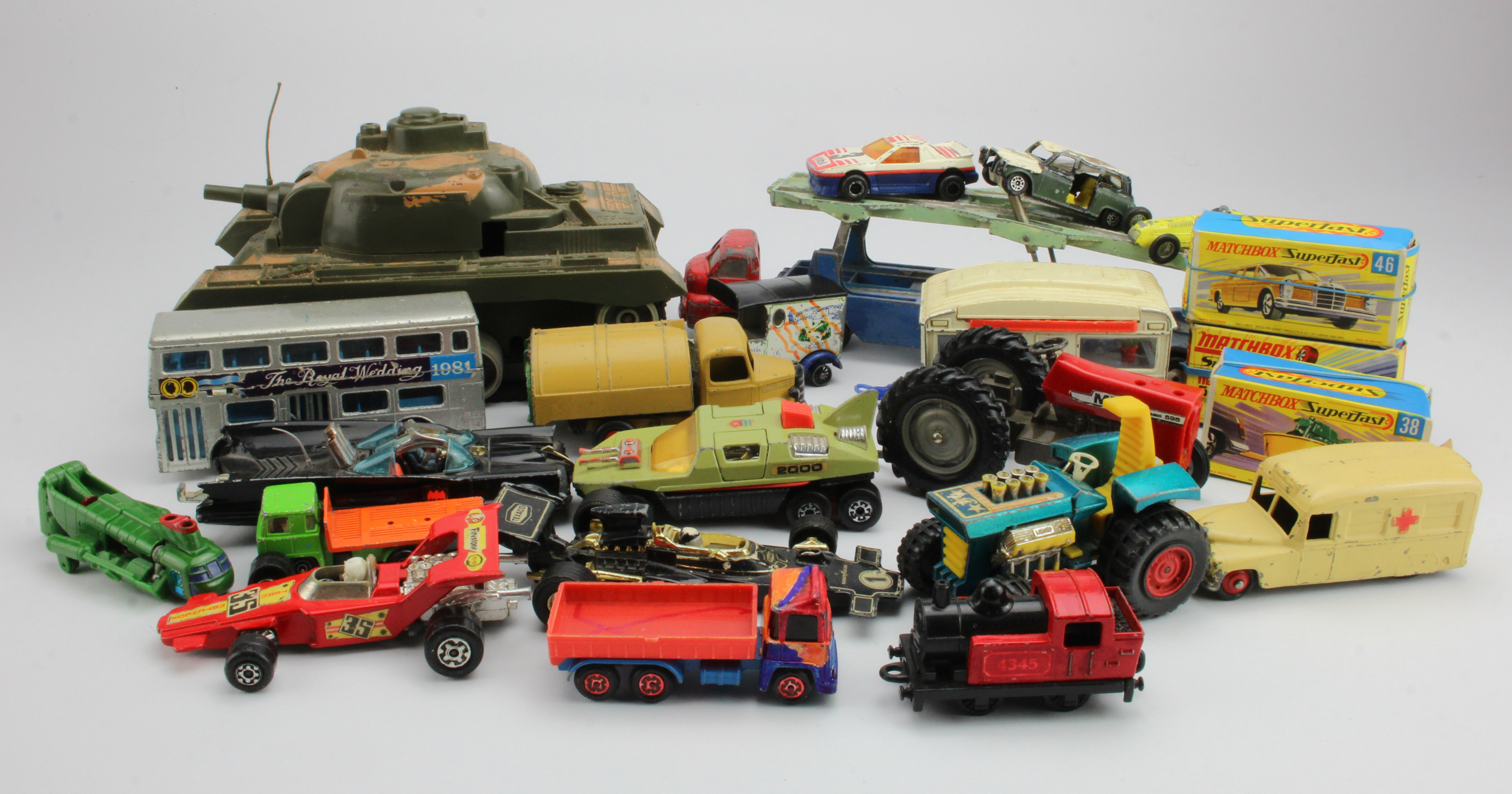 Diecast. A collection of mostly diecast model toys, including, Dinky, Corgi, Matchbox, etc.