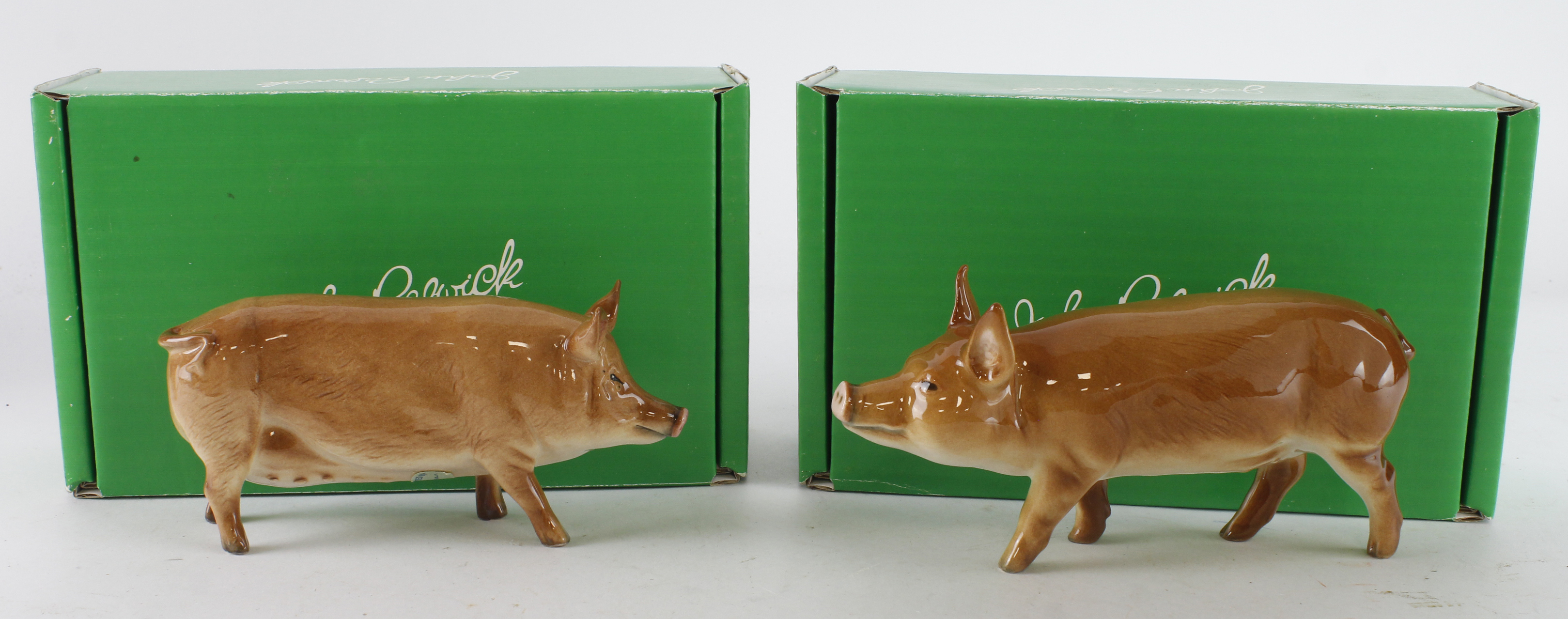 Beswick. Two boxed Beswick figures, comprising Tamworth Pig & Tamworth Sow, tallest 8.5cm approx.