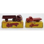 Dinky Toys. Two boxed Dinky models, comprising no. 421 'Electric Articulated Lorry' (red); no.