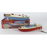 Sutcliffe tinplate clockwork bluebird boat, contained in original box, together with an unboxed