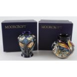 Moorcroft. Two small Moorcroft vases, tallest 90mm approx., both contained in Moorcroft boxes