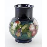 Moorcroft Clematis pattern vase, makers marks to base, height 12.5cm approx.