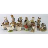 Beatrix Potter. Seventeen Beatrix Potter figures by Beswick & Royal Albert