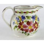Swansea Pottery jug with handpainted floral decoration, height 11cm approx.