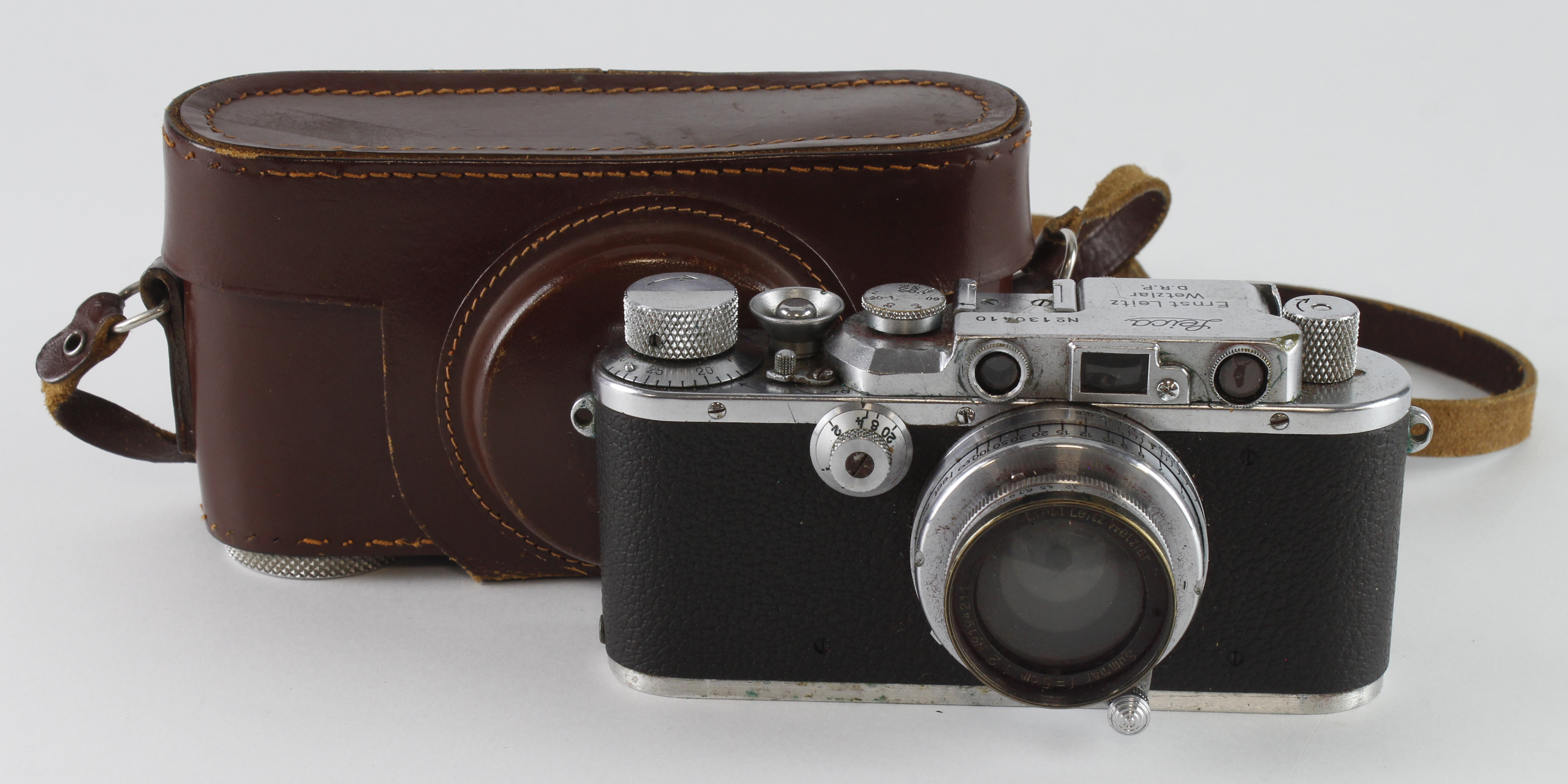Leica IIIa Rangefinder camera (no. 130410), with Summar f=5cm 1.2 lens (no. 194211), contained in