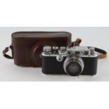 Leica IIIa Rangefinder camera (no. 130410), with Summar f=5cm 1.2 lens (no. 194211), contained in