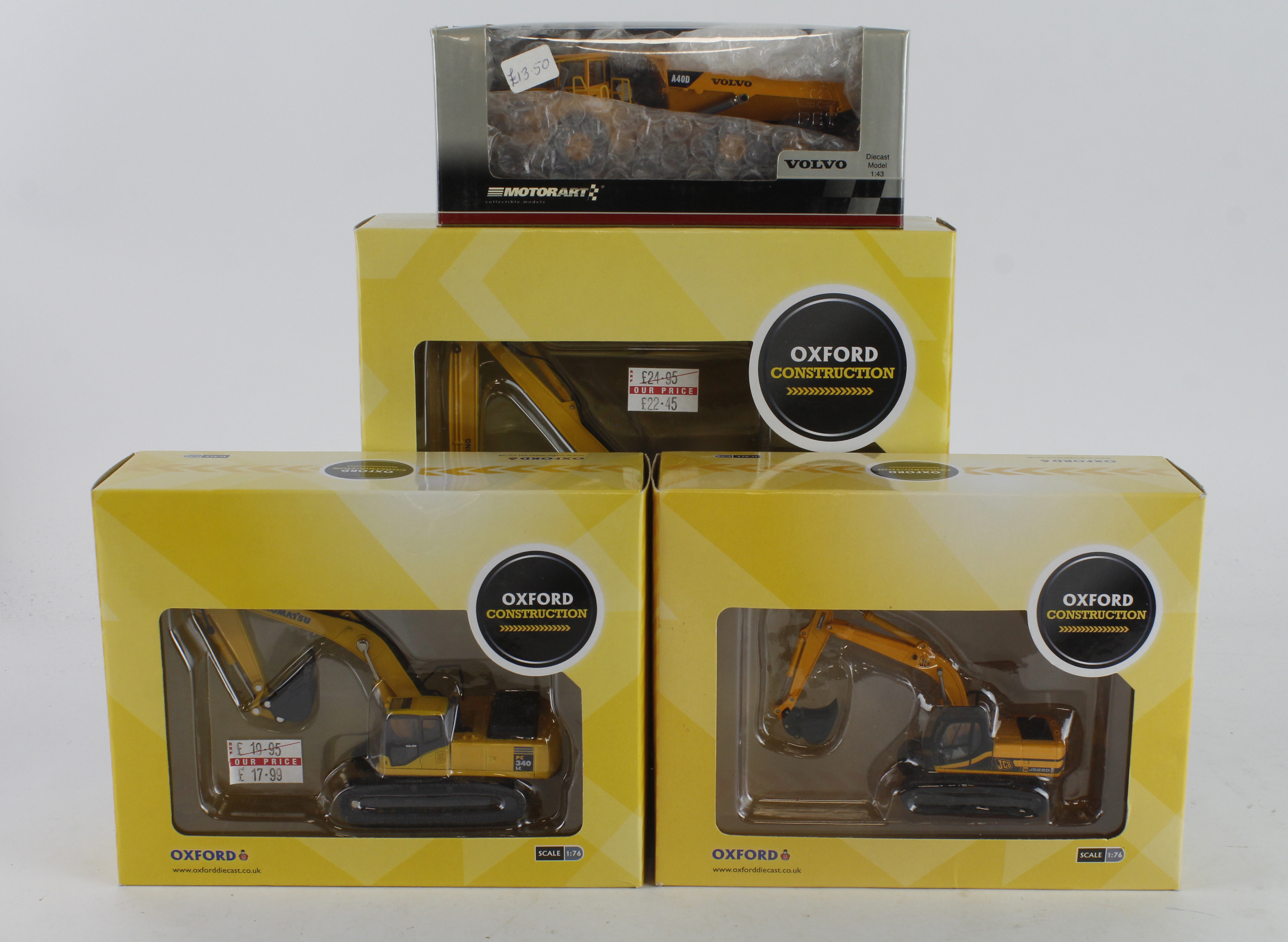 Oxford Diecast. Three boxed Oxford diecast Construction models, comprising Komatsu PC340LC Excavator