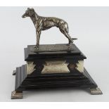 Greyhound interest. A large greyhound art deco trophy with hinged lid, with unengraved plaquest,