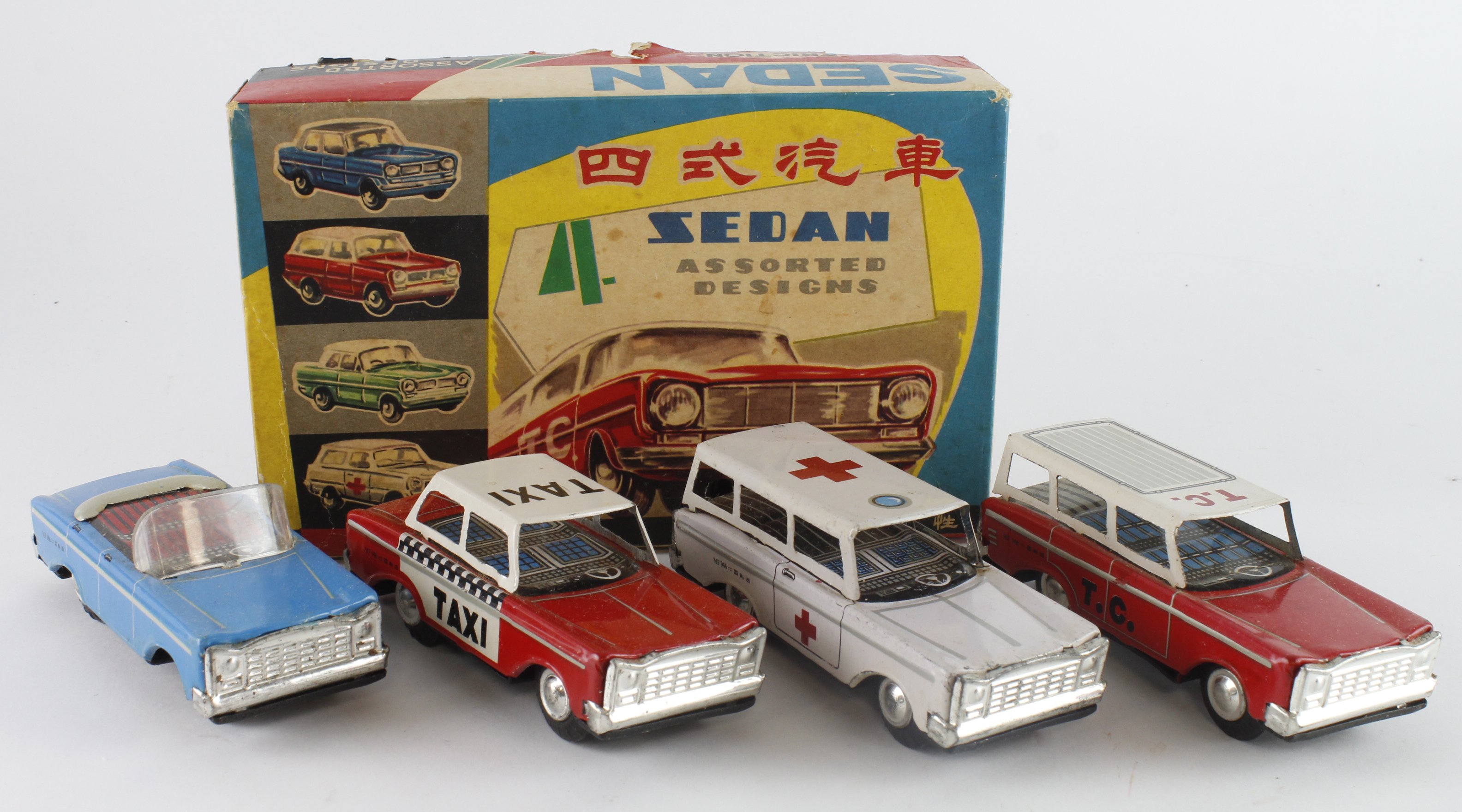 Tinplate. A Chinese boxed set of tinplate models 'Four Sedan Assorted Designs'