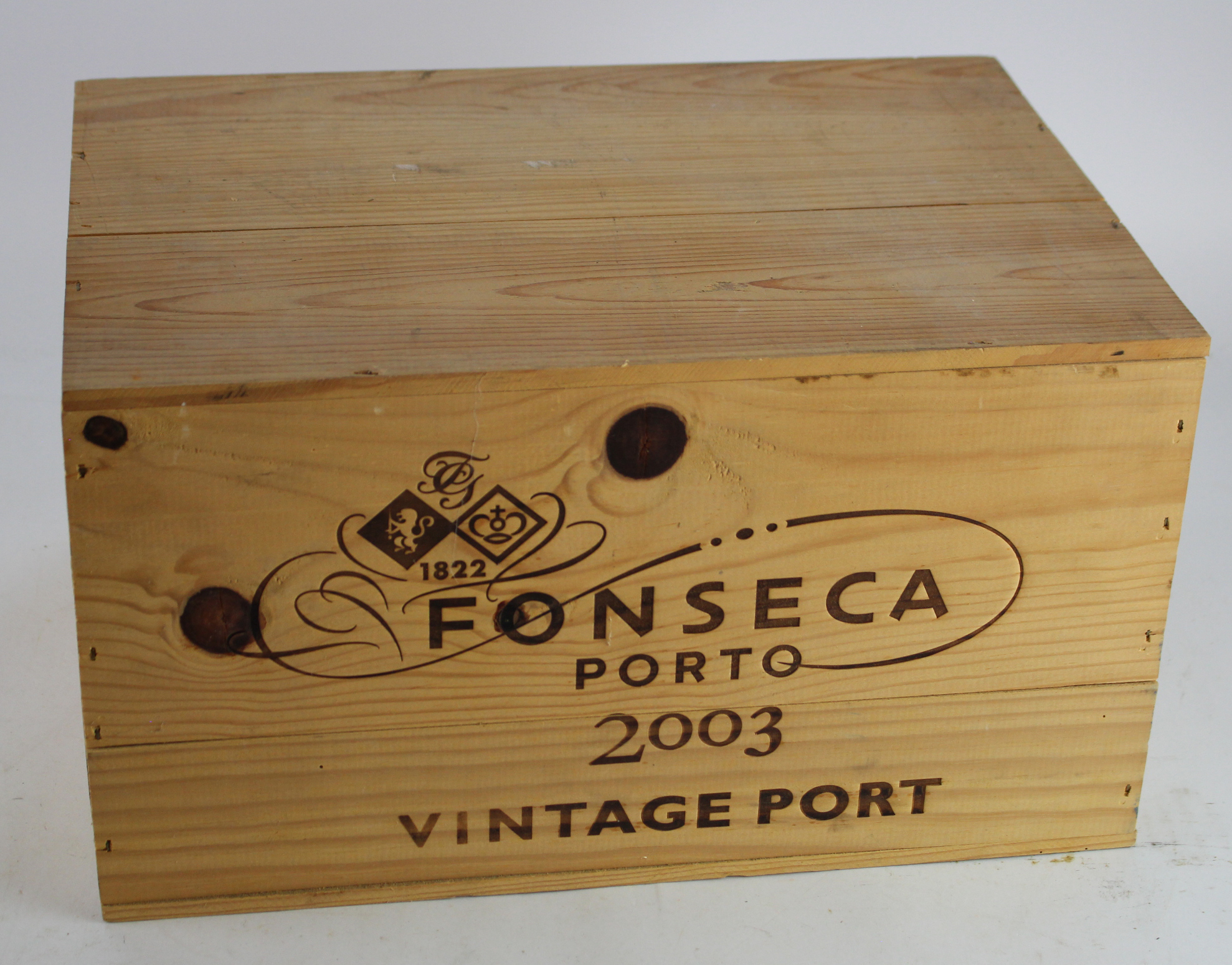 Fonseca. An unopened case of Fonseca Vintage Port 2003 (12 bottles), buyer collects or arranges