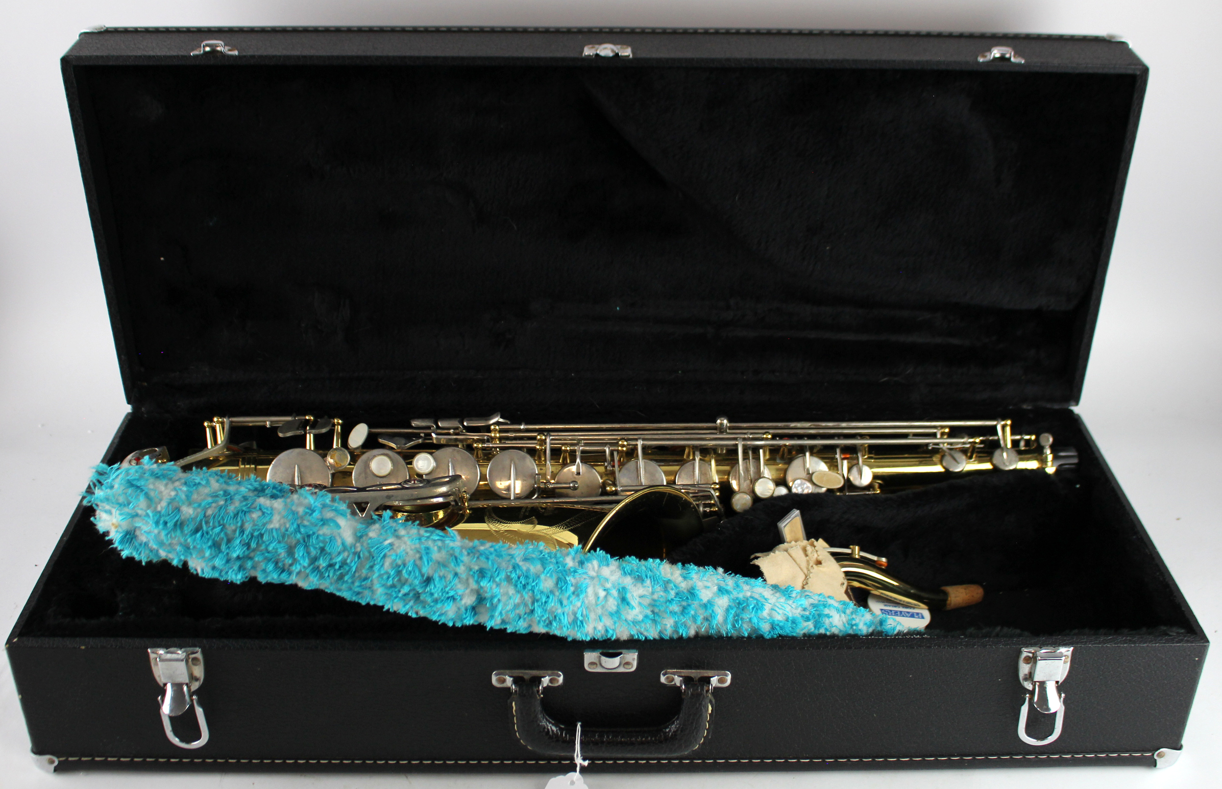 Earlham saxophone (no. H1991636), neck piece present, contained in a fitted case