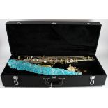 Earlham saxophone (no. H1991636), neck piece present, contained in a fitted case