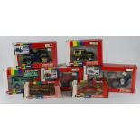 Britains. A group of seven boxed Britains 1:32 scale farm tractors and accessories, comprising 9508,