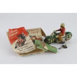 Schuco Curvo 1000 tinplate clockwork motorcycle and rider, comes with original instructions and