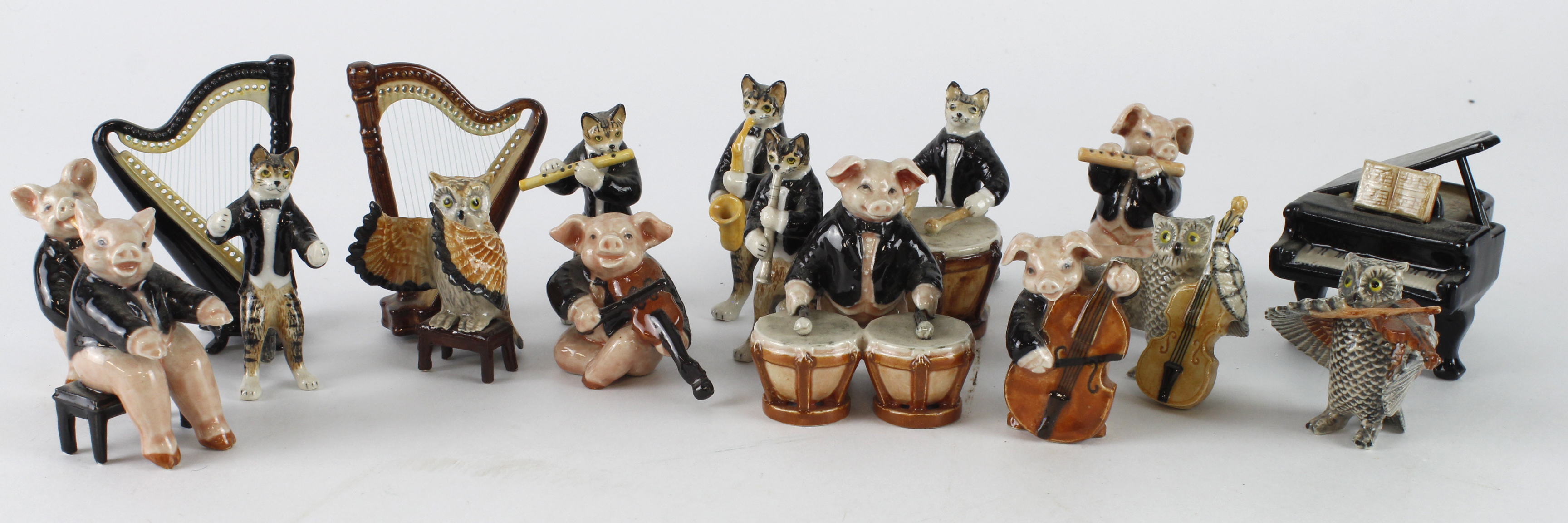 Klima. Fourteen miniature porcelain animals by Klima playing various orchestra musical