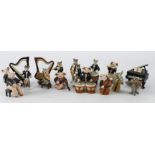 Klima. Fourteen miniature porcelain animals by Klima playing various orchestra musical