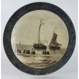 Large Rozenburg charger, depicting boats with figures in the foreground, bears the artists name to