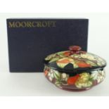 Moorcroft Winter Harvest pattern lidded bowl, diameter 12.5cm approx., contained in a Moorcroft box