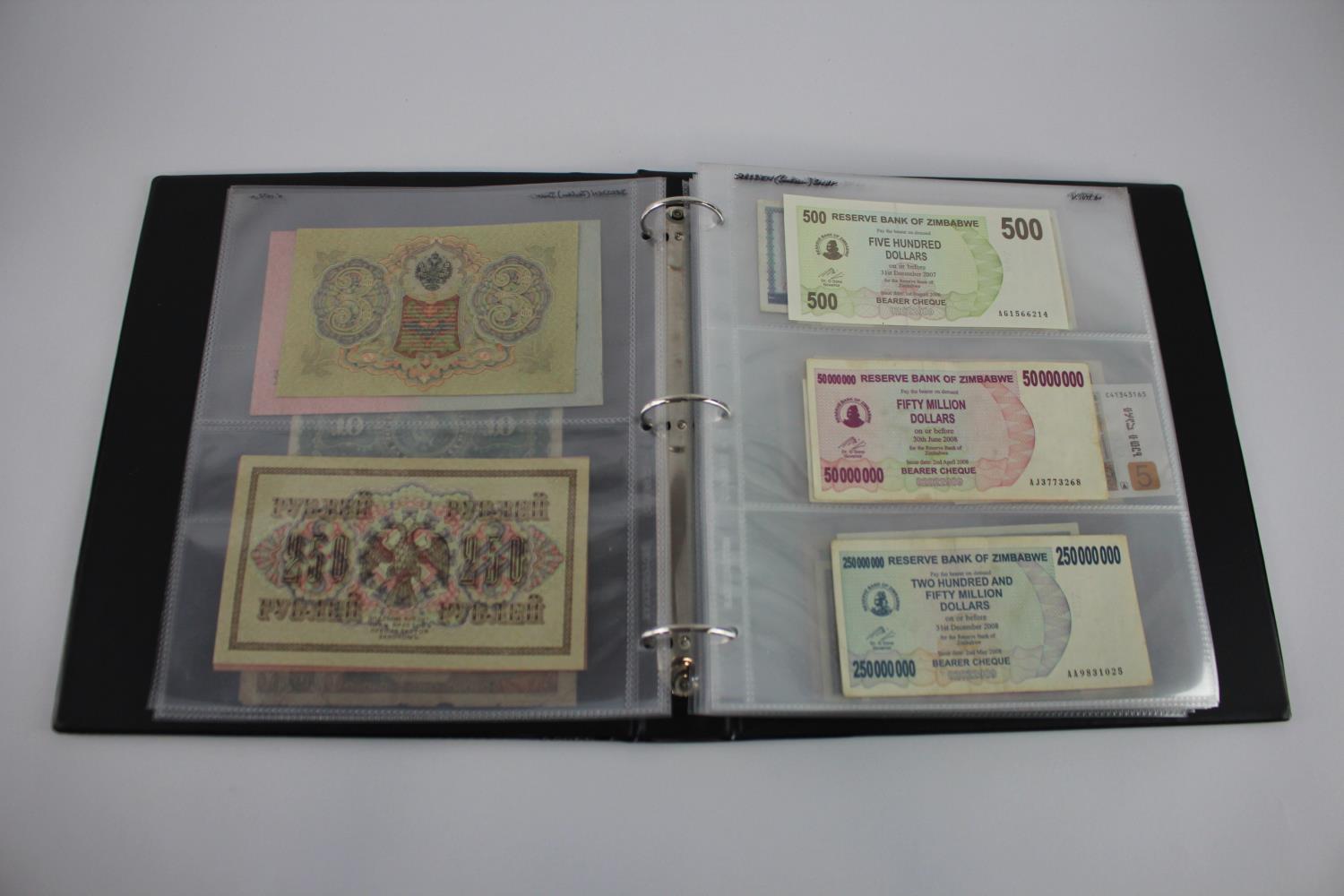 World in album (129), including Martinique, Cuba, Russia, Iran, Algeria, Suriname, India, Sierra - Image 5 of 44