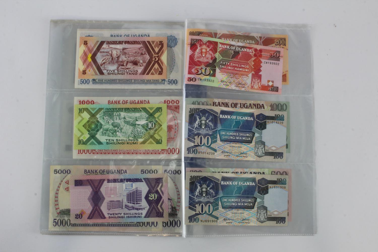 Uganda (35), an Uncirculated group in album pages, 5 Shillings, 10 Shillings, 20 Shillings, 50 - Image 12 of 15