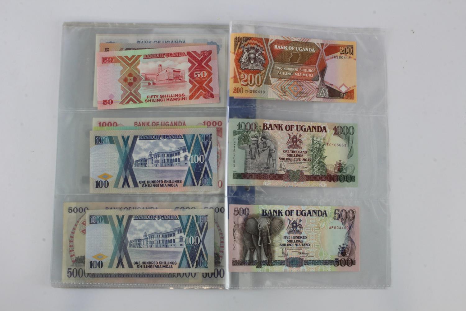 Uganda (35), an Uncirculated group in album pages, 5 Shillings, 10 Shillings, 20 Shillings, 50 - Image 13 of 15