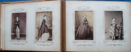 Photographs, a Victorian leather album with metal corners, clasp and central cartouche containing