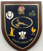 Rugby memorabilia, SA Rugby 1889-1989 larger wooden plaque measuring 9" by 7", featuring Springbok