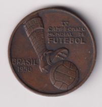Football medal, World Cup 1950, Brazil, a circular copper medal with raised boot & ball decoration &
