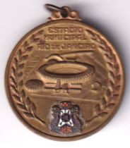 Football medal, World Cup 1950, Brazil, a circular bronze & enamel pendant with raised stadium