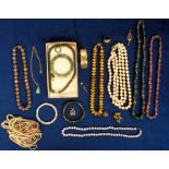 Jewellery and EPNS, a selection of vintage jewellery to include an amber bead necklace, a rolled