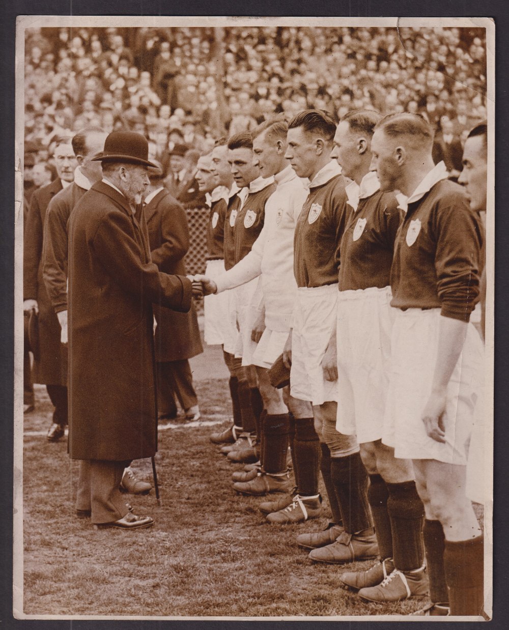 Football press photo, a b/w press photo showing the Arsenal team being presented to the King prior