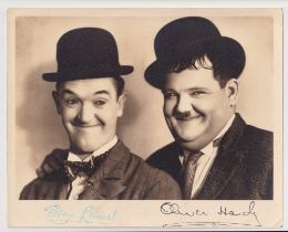 Autographs, a signed 10 x 8" photograph of Laurel & Hardy with signatures of both (gd)