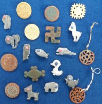 Militaria, a collection of 50+ German Winter Charity badges to include Germanic sun symbols,