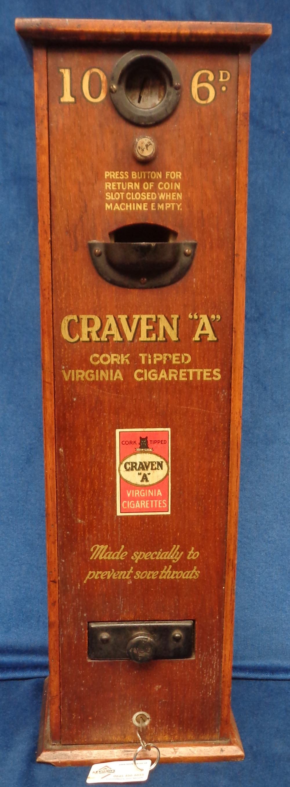 Cigarette machine, a vintage 'Craven A' wooden cigarette machine, 6d for 10 cigarettes, with