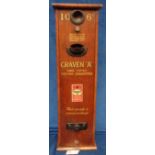 Cigarette machine, a vintage 'Craven A' wooden cigarette machine, 6d for 10 cigarettes, with