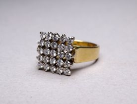 An 18ct gold diamond set ring - claw set with twenty five stones, size O, weight 9.1g.
