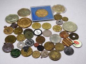 A quantity of various 20th century medals and tokens.