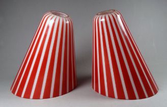 A pair of vintage glass lamp shades - red and white striped and of truncated conical form, height