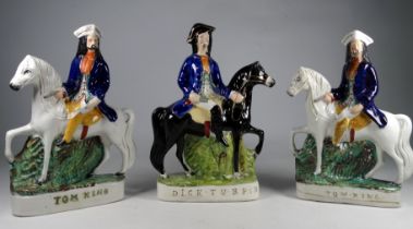 A pair of 19th century Staffordshire flatback figures - modelled as Tom Kind, dressed in a blue