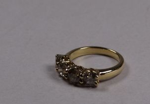 An 18ct yellow gold diamond four stone ring - the circular brilliant cut diamonds weighing 2.02ct,
