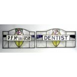 Two Arts & Crafts style stained glass name signs - combined to form the inscription 'P.F. McIntosh