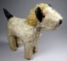 A vintage plush fox hound - white, black and cream, in the manner of Merrythought, height 22cm.