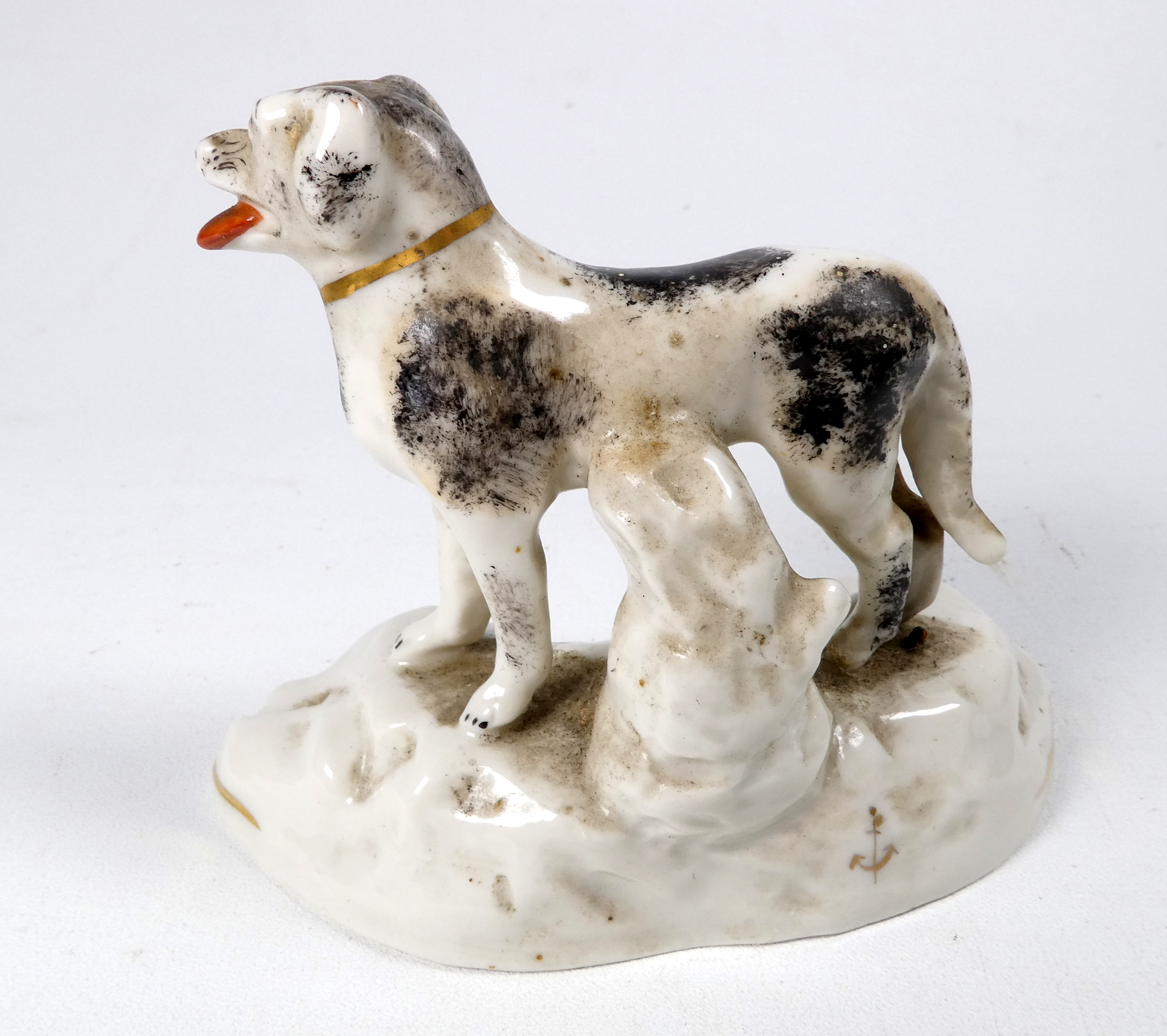 A pair of Chelsea style models of dogs - standing on a rocky base, sponge decorated, with a gilt - Image 3 of 7