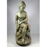 A 20th century reconstituted stone figure of a seated lady - later painted, height 61cm.