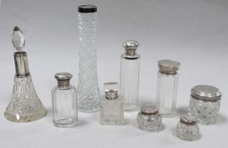 A silver mounted cut glass scent bottle - marks indistinct, together with eight other silver mounted