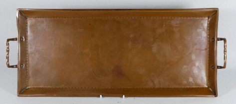 An early 20th century rectangular copper tray - with twin handles, length 53cm.